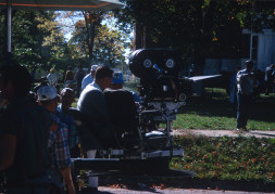 Crew filming a scene with camera outside of the courthouse used in the trial scene. Actor Kyle Johnson (Newt Winger) stands in the background (left, mustard colored sweater).