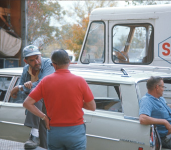 Crew members with production vehicles.