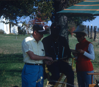 Production crew members and Director Gordon Parks (center) outside of set for Winger Home.