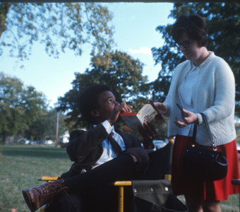 Lead Actor Kyle Johnson (Newt Winger) points out a part of Gordon Parks‚Äô novel version of The Learning Tree to Peggy Rea (Miss McClintock).