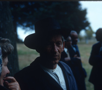 Actor Malcolm Atterbury (Silas Newhall) and fellow actors around filming of the Sarah Winger's funeral scene.