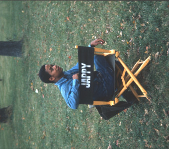 Actor Stephen Perry (Jappy) seated in his actor‚Äôs chair.