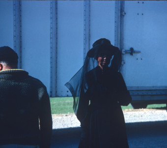 Actress Hope Summers (Mrs. Kiner) in black attire. Photograph likely taken around time of filming of the funeral of Sarah Winger.