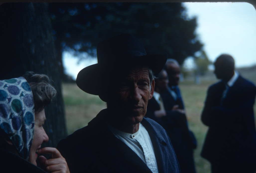 Actor Malcolm Atterbury (Silas Newhall) and fellow actors around filming of the Sarah Winger's funeral scene.