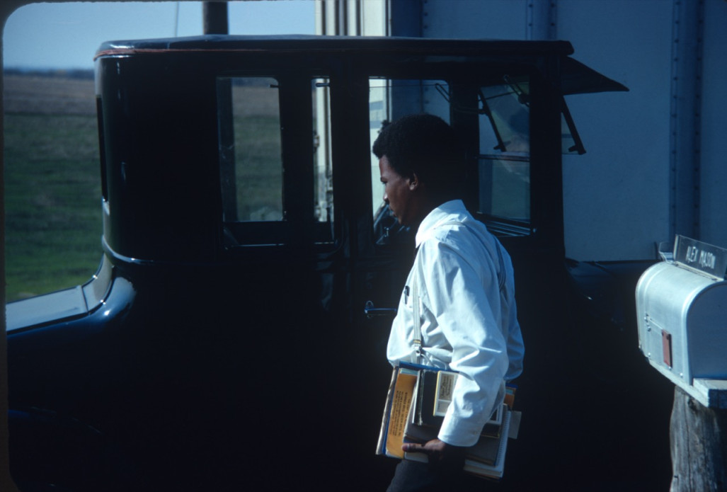 Actor Kyle Johnson (Newt Winger) approaching a black buggy.