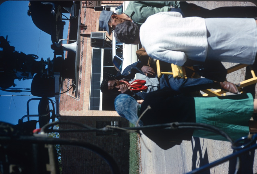 Director Gordon Parks (seated) and crew or actors in downtown Fort Scott, Kansas.