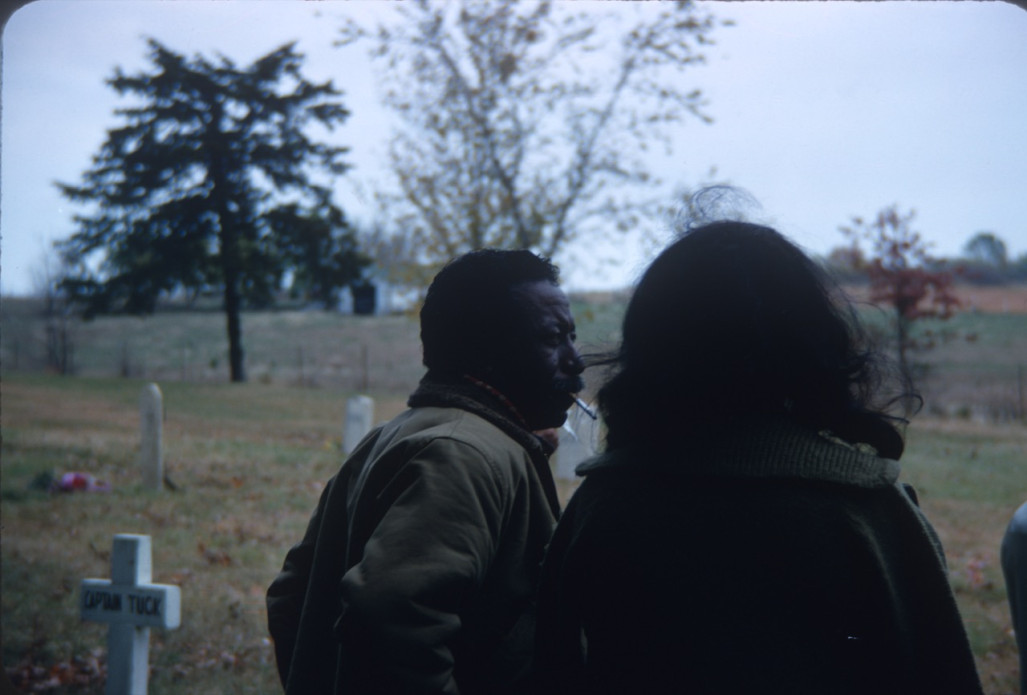 Director Gordon Parks and actress Carol Lamond (Big Mabel) standing in graveyard used for Sarah Winger funeral scene.